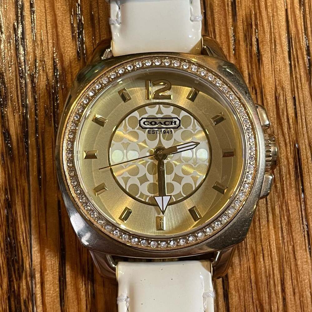 Coach Boyfriend Gold Tone Crystal Bezel Watch with White Strap